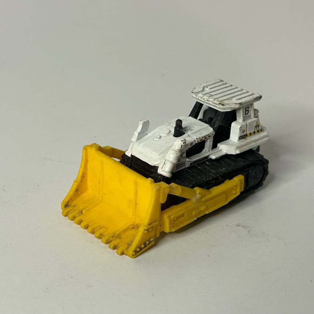 Matchbox Ground Breaker Bulldozer White and Yellow Diecast Toy